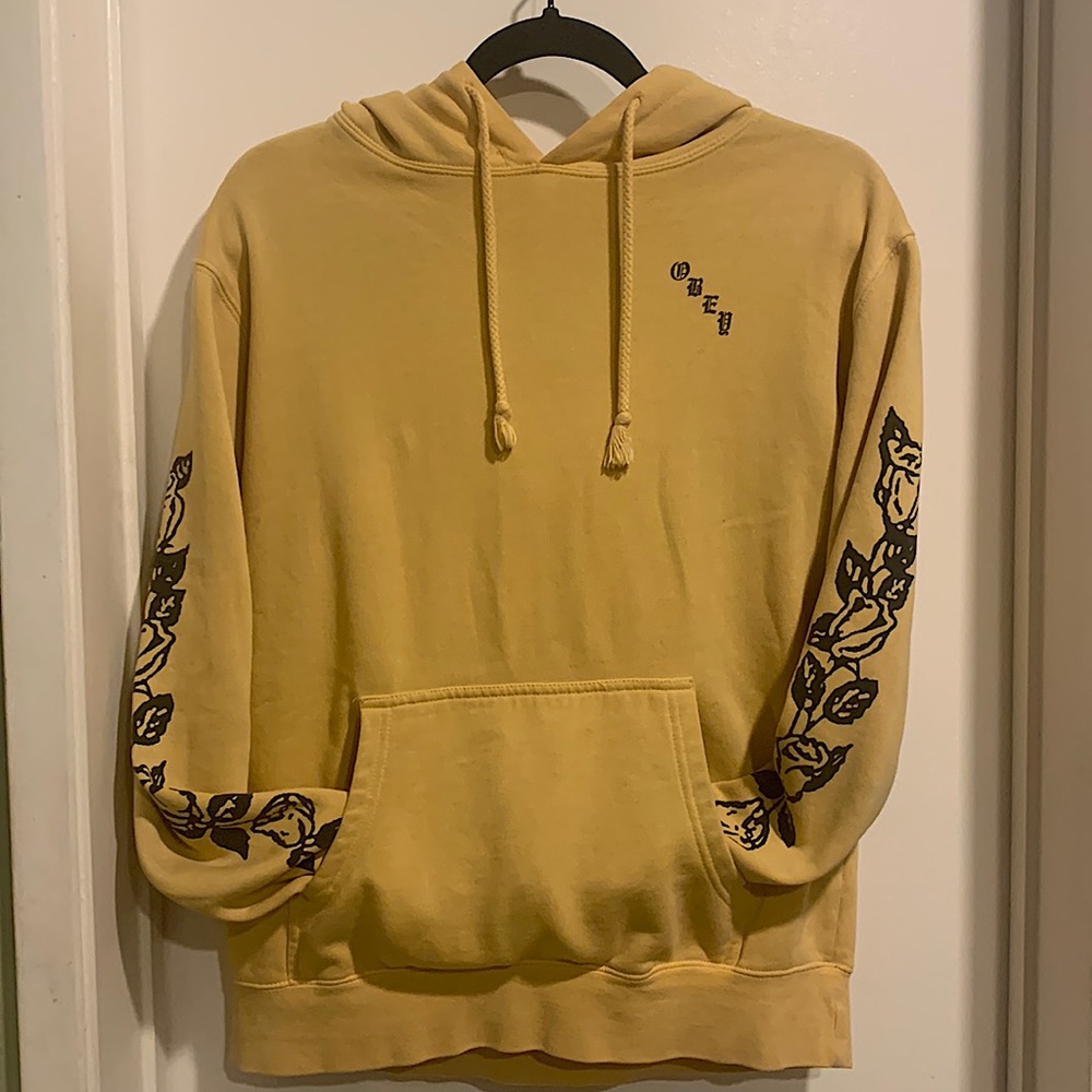 Pastel yellow sweatshirt/hoodie rose print size medium brand is Obey